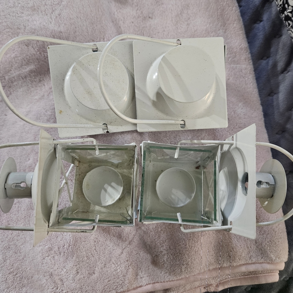 Set of four white metal mini lanterns